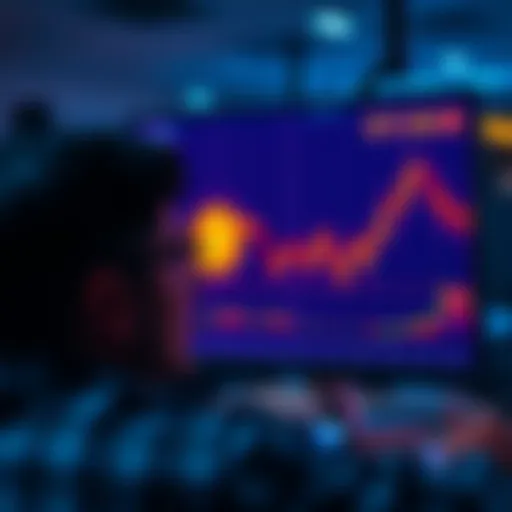 A person looking at a screen showing a declining Bitcoin chart, symbolizing market uncertainty.