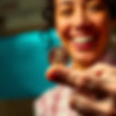 A close-up of a hand holding a shiny penny, symbolizing a small achievement, with a joyful expression in the background
