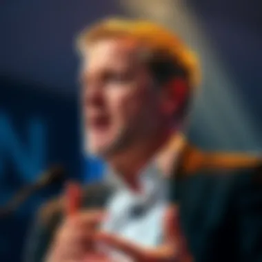 Brian Armstrong, CEO of Coinbase, speaking at a conference about charity and its negative impact on society.