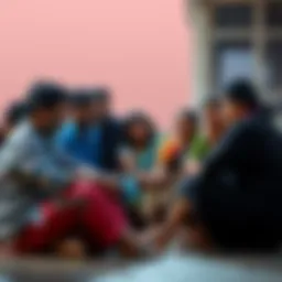 A group of diverse people in Thalassery sitting together, sharing stories and supporting each other during tough times.