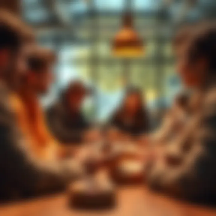 A group of people engaging in conversation with donuts on the table, sharing ideas and insights in a friendly environment.