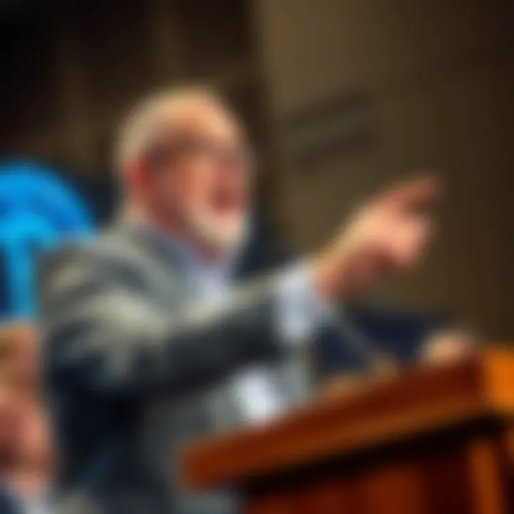 Dave Ramsey speaking at a podium while pointing, criticizing Bitcoin buyers in a public setting