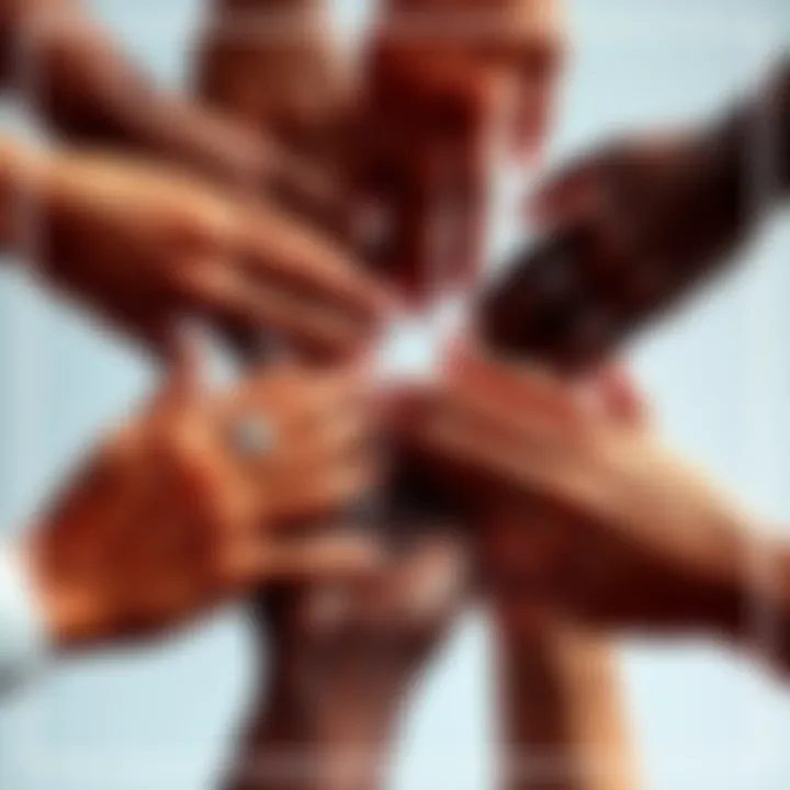 A group of diverse hands of different skin tones coming together, symbolizing unity in individuality.