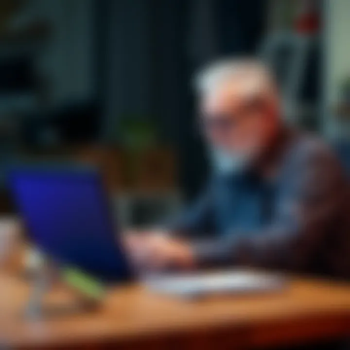 A 71-year-old man seated at a desk, focused on a laptop screen while reviewing cryptocurrency wallet information in Australia.