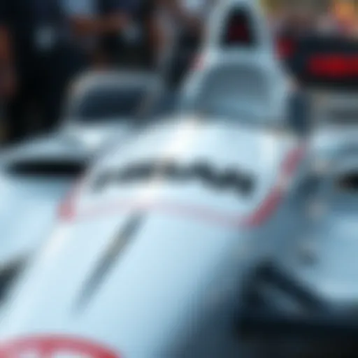 Close-up view of the HBAR logo displayed prominently on a new Indy car model, showcasing its integration in racing.