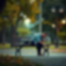 A man sits on a park bench with his head down, showing regret and sadness after a breakup due to cheating.