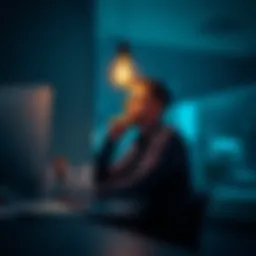 A person sits thoughtfully at a desk with a light bulb above their head, symbolizing ideas and curiosity.