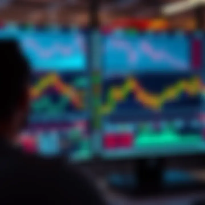Individual staring at a computer screen displaying falling stock market graphs, showing signs of concern