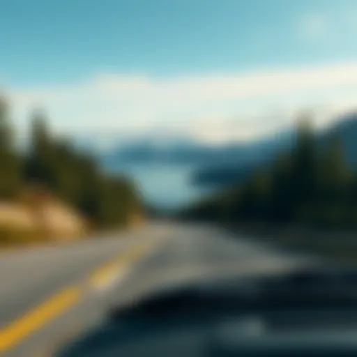 A scenic view of a car driving along a coastal highway with mountains in the distance and trees lining the road