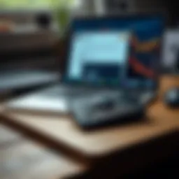 A Trezor 7 cryptocurrency wallet resting on a wooden desk with a laptop in the background, showing an open software update screen.