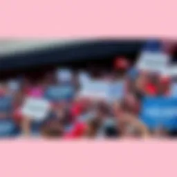 A crowd of enthusiastic Trump supporters gathered at a rally, holding signs and flags, showing their continued support for the former president.