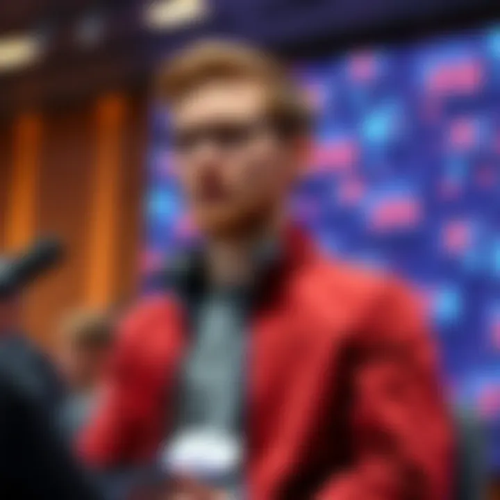 Vitalik Buterin speaking at a conference about the dangers of using AI in cryptocurrency wallets.