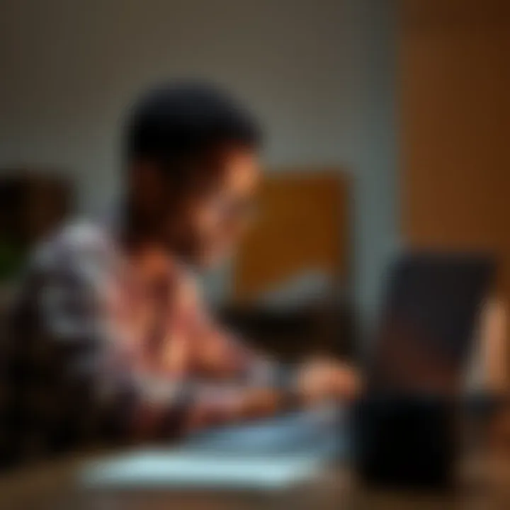 Flavio, a young Computer Engineering student in Angola, uses a laptop to learn programming and explore Bitcoin opportunities.