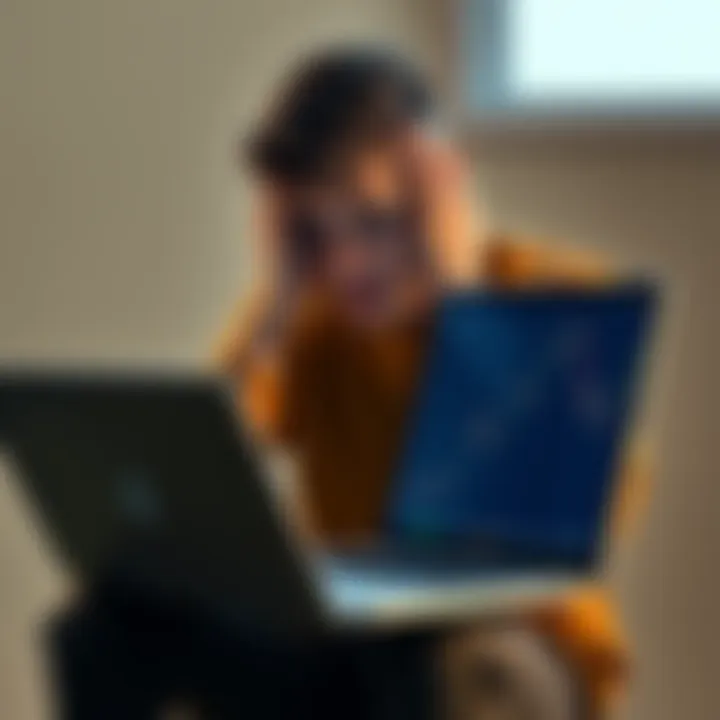A 23-year-old man sitting alone, looking distressed while holding his head in his hands, with a laptop open showing a cryptocurrency chart in the background.